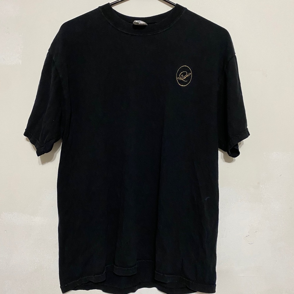 Black T-Shirt with a gold letter